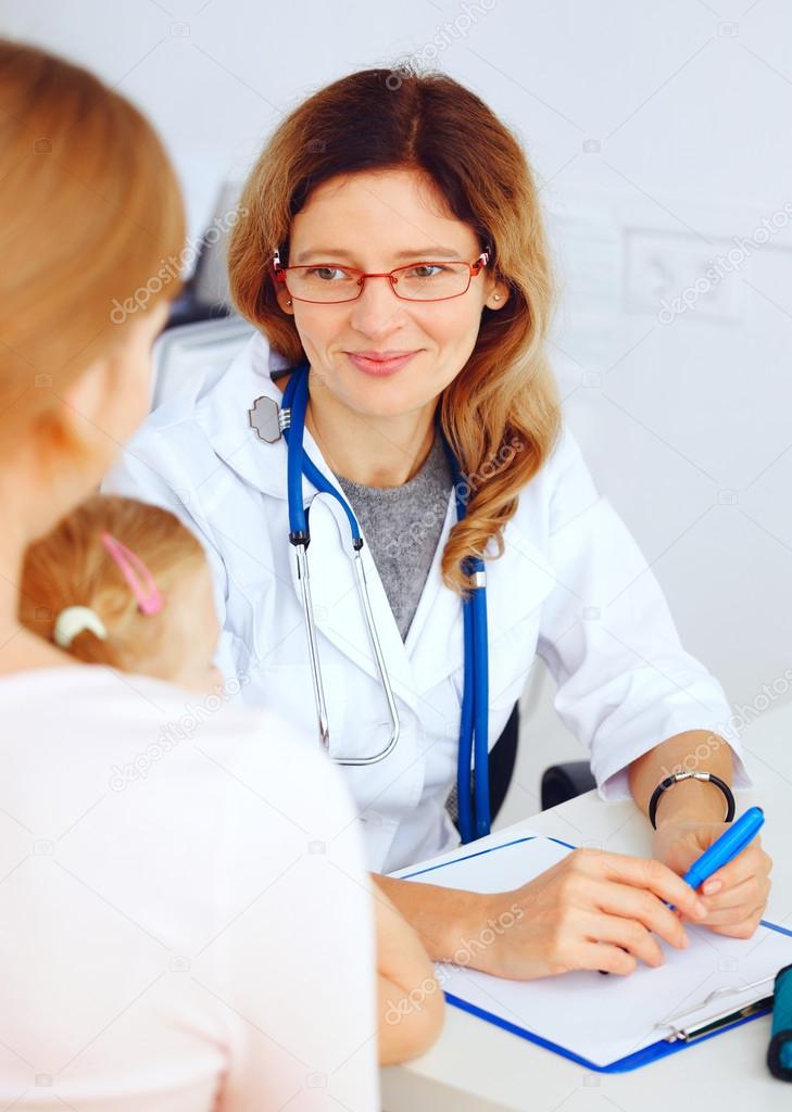 Child with her mother visiting doctor.