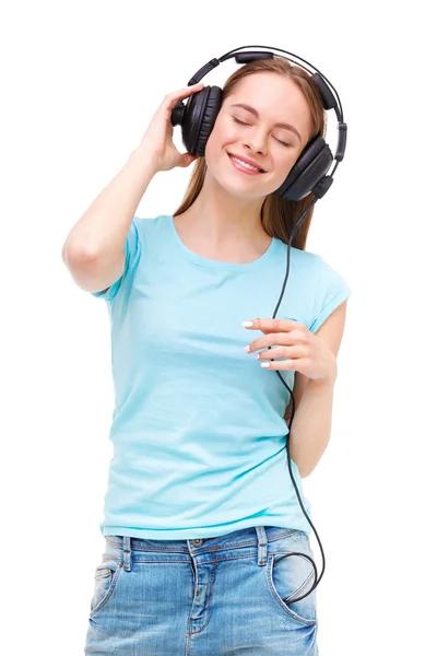 Mujer joven con auriculares escuchando música y bailando - iso — Foto de Stock