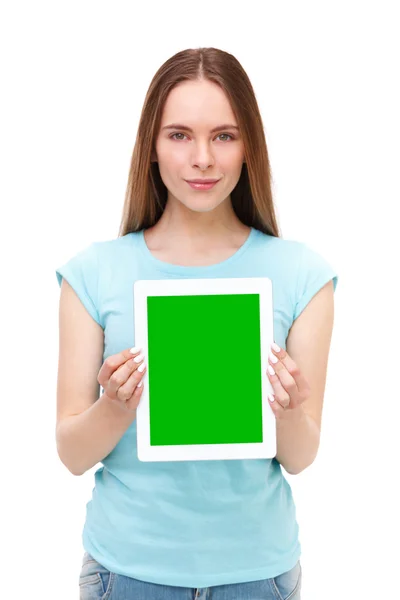 Young beautiful woman holding white tablet with copyspace - isolated on white. — Stock Photo, Image