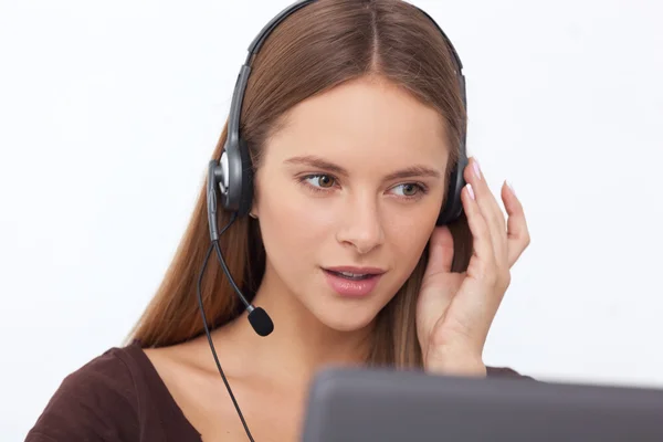 Retrato de feliz jovem operador de telefone de apoio com fone de ouvido . Fotografia De Stock