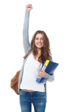 El yükselterek heyecanlı kız öğrencinin elini üzerine beyaz izole..