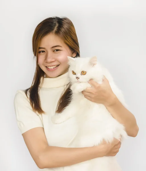 Asiático adolescente y un blanco gato —  Fotos de Stock