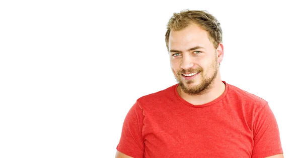 Yakışıklı adam ışınlama gülümseme ile sakallı — Stok fotoğraf