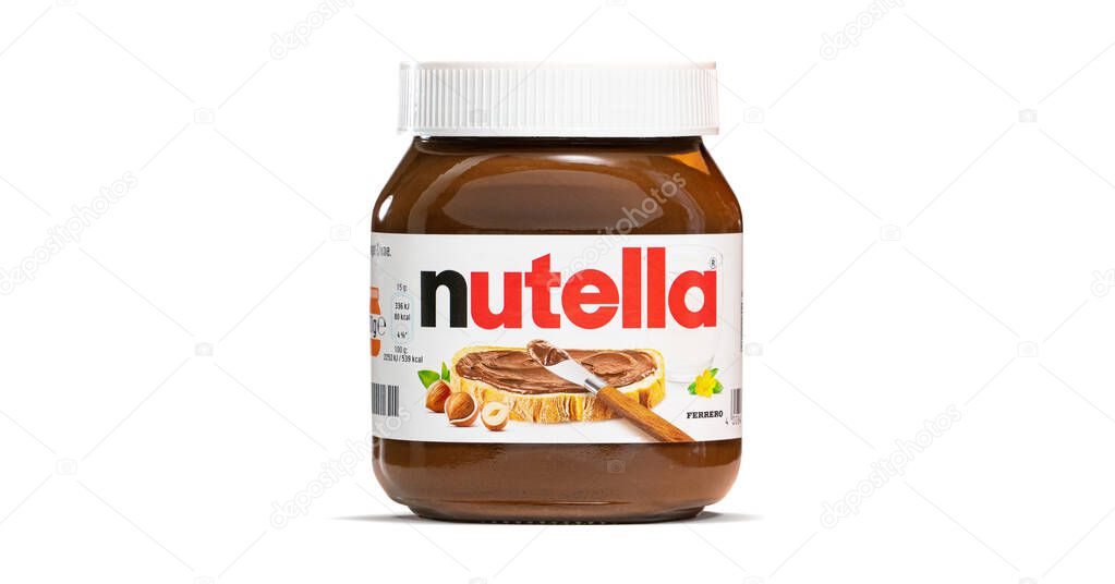 AACHEN, GERMANY - JAN 07, 2021: Pot of Nutella, the popular brand name of a sweetened hazelnut cocoa spread, introduced to the market in 1964 by Italian company Ferrero who celebrates 75 years anniversary in 2021