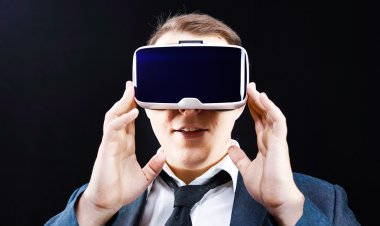 Businessman uses Virtual Reality clipart