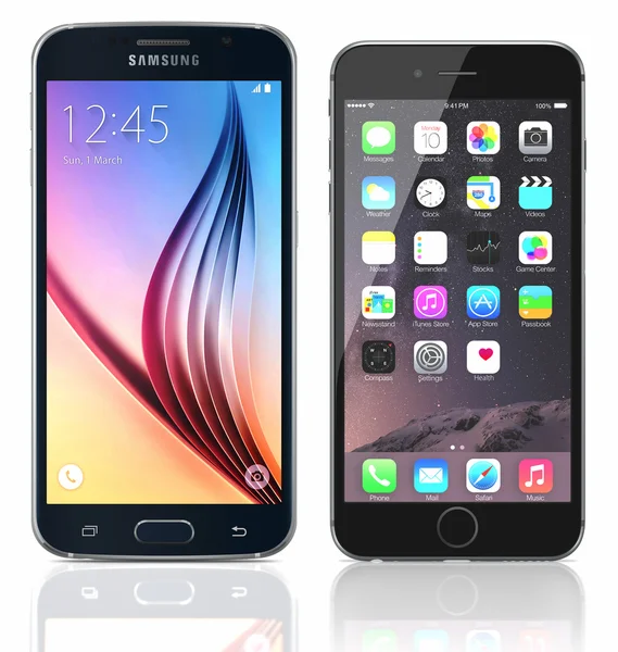 黑色蓝宝石三星银河 S6 和黑苹果 iphone 6 对 whi — 图库照片