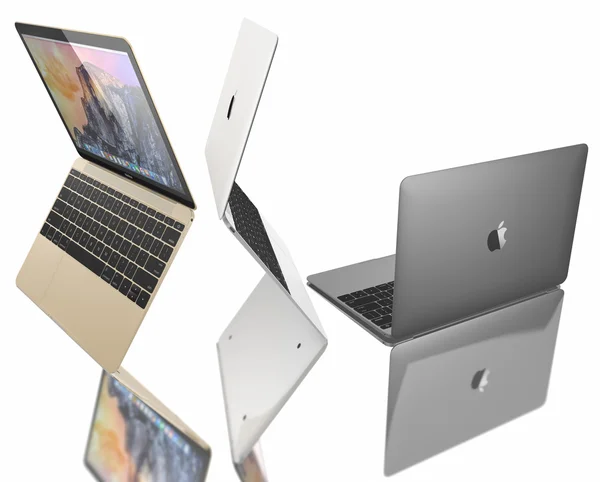 Новый золотой, серебряный и космический серый MacBook Air — стоковое фото