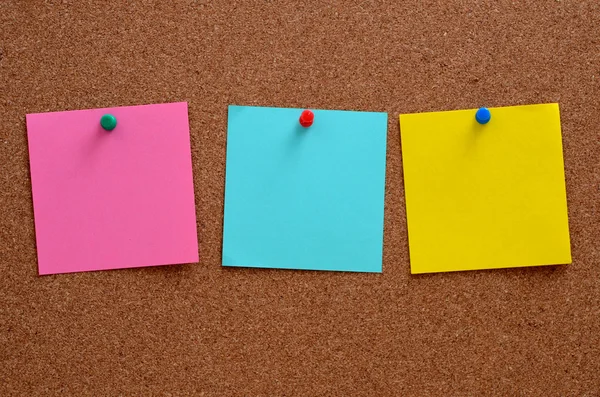 Blank notes pinned into brown corkboard — Stock Photo, Image