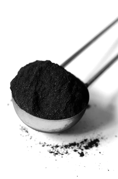 Activated charcoal powder — Stock Photo, Image
