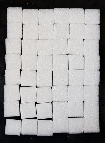 Кубики белого сахара — стоковое фото