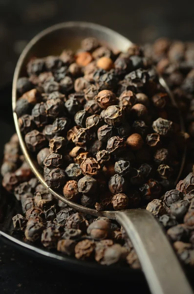 Close-up of black peppercorns — Stock Photo, Image