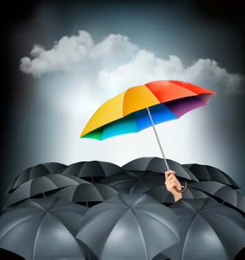One rainbow umbrella standing out on a grey background. Unique c clipart