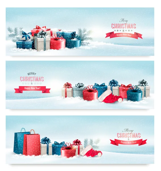 Tres pancartas de Navidad con regalos. Vector . — Vector de stock