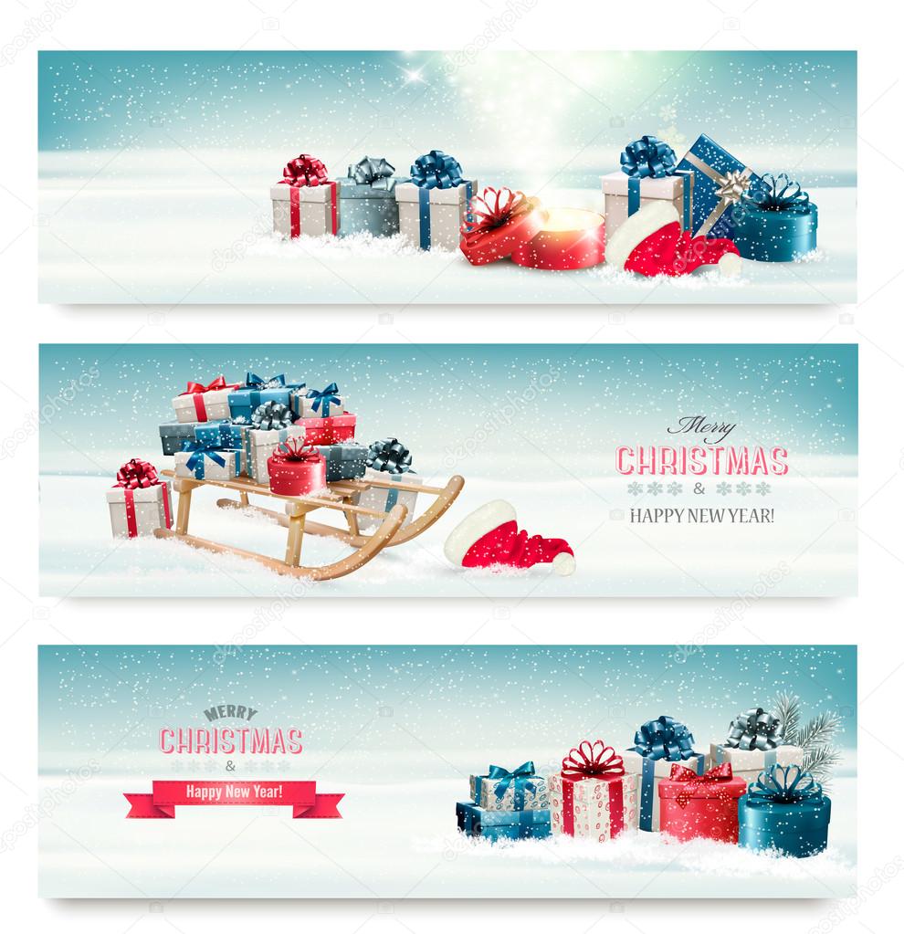 Three Christmas banners with presents and a sleigh. Vector.