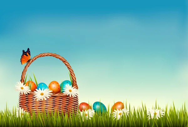 Fondo de Pascua de primavera. Cesta con huevos de Pascua en la hierba con — Vector de stock