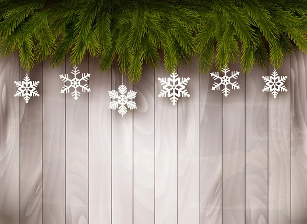 Fundo com galhos de árvore de Natal e flocos de neve na frente — Vetor de Stock