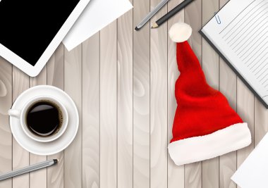 Noel Baba şapkası, Tablet ve ofis malzemeleri ile Office arka plan. Bu