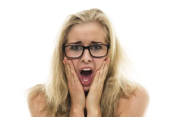 Attractive young woman with a horrified expression — Stock Photo, Image