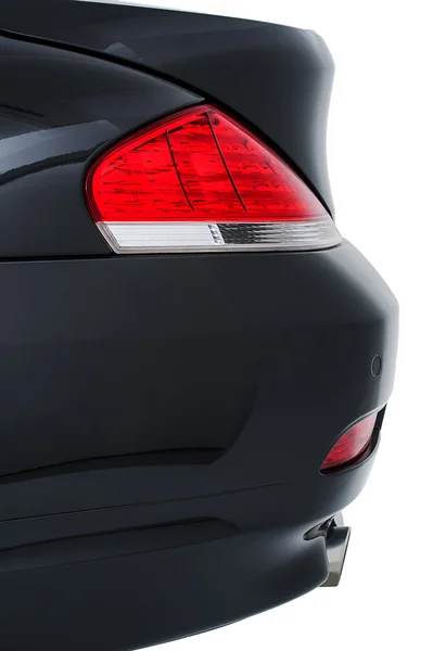 Rear tail light of a modern black car — Stock Photo, Image