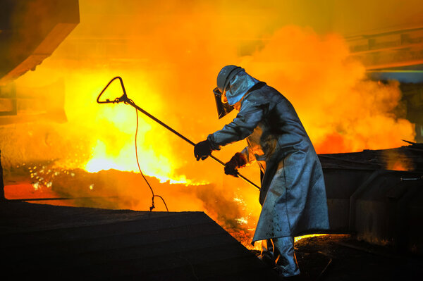 worker with hot steel