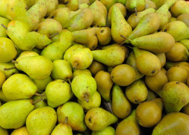 Green pears at a famers market clipart