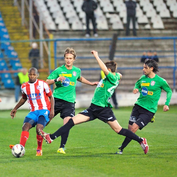 Neznámý fotbalistů provádí — Stock fotografie