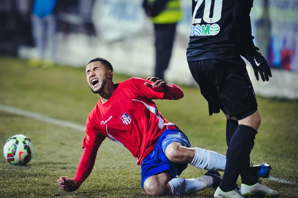 Neznámý fotbalistů provádí — Stock fotografie