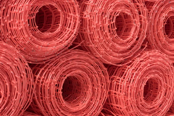 Yığın kırmızı plastik mesh rulo — Stok fotoğraf