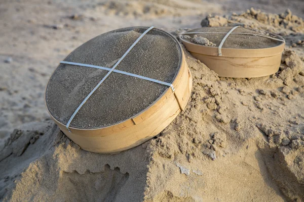 Construction sieves on sand — Stock Photo, Image