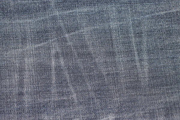 Kain latar belakang tekstur Jeans dari tekstil denim biru — Stok Foto