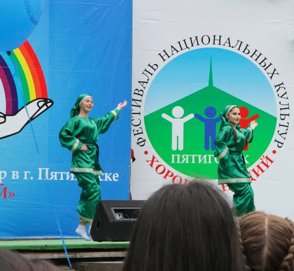 Festival of National cultures - Round dance of nations. Pyatigorsk, Russian Federation 12 june 2017. Dancing girls