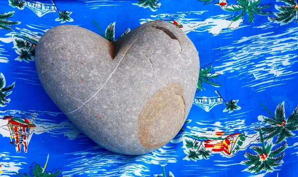 Heart of stone and blue background with palms — Stock Photo, Image