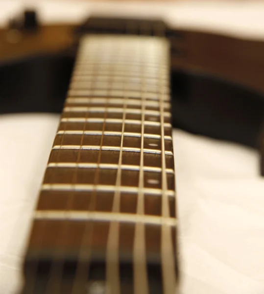 Black electric guitar isolated on the white backgriund — Stock Photo, Image