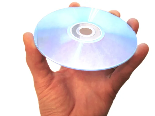 Mans ręki trzymającej compact disc na na białym tle palec — Zdjęcie stockowe