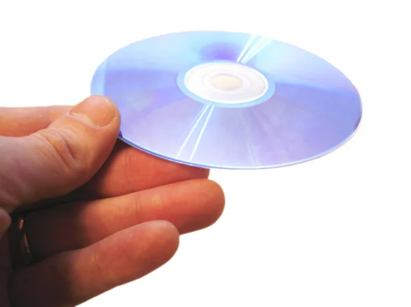Mans ruka drží kompaktní disk na prst, izolované — Stock fotografie