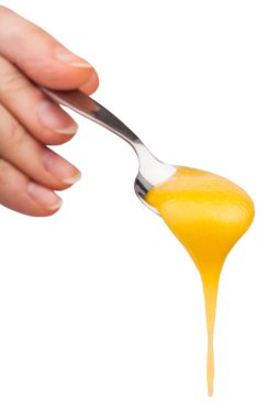 el ile akan sarı kaşık yoğun bal tutan