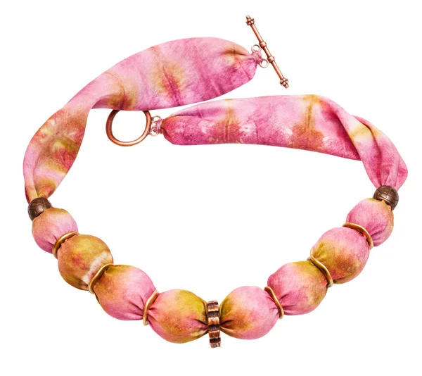 Necklace from pink painted silk and copper beads — Stock Photo, Image