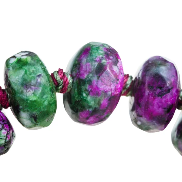 Beads from Zoisite gem stone close up isolated — Stock Photo, Image