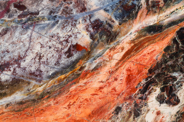 полированная поверхность камня яшмы
