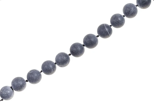 String of beads from gray Shungite gem stone — Stock Photo, Image