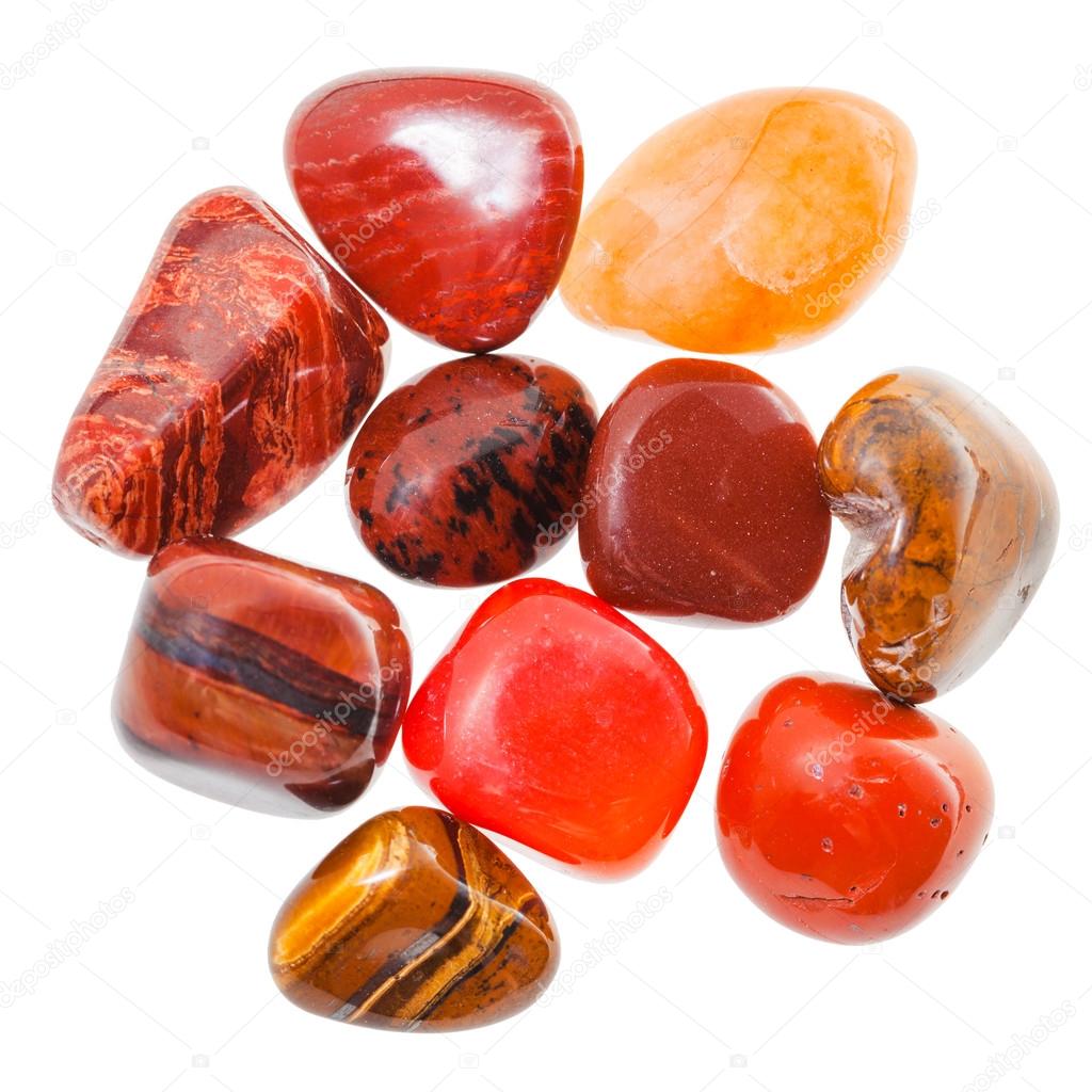 pile of red and orange natural mineral gemstones