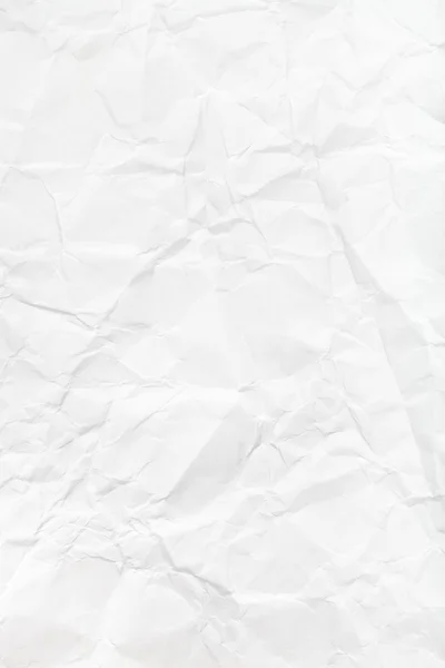 Vertical background from white crumpled paper — Stock Photo, Image