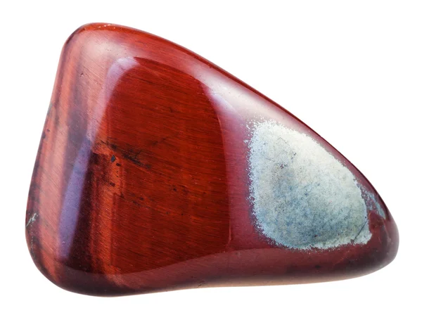 Pedra preciosa vermelha caída do boi-olho isolado no branco — Fotografia de Stock