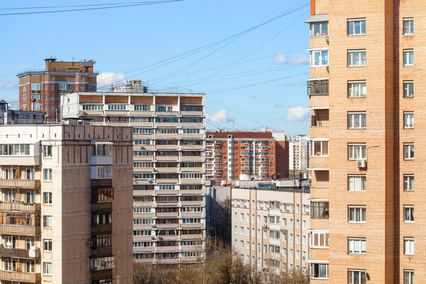 City building in living quarter in sunny spring day, Moscow, Russia