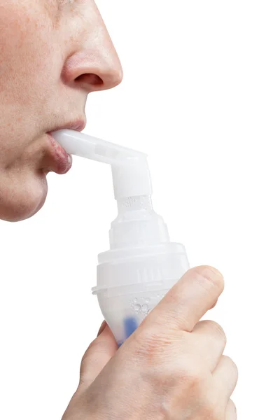 Mouthpiece of jet nebuliser in lips of patient — Stock Photo, Image