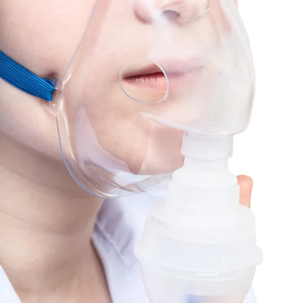 Teen inhales with face mask of nebulizer close up — Stock Photo, Image