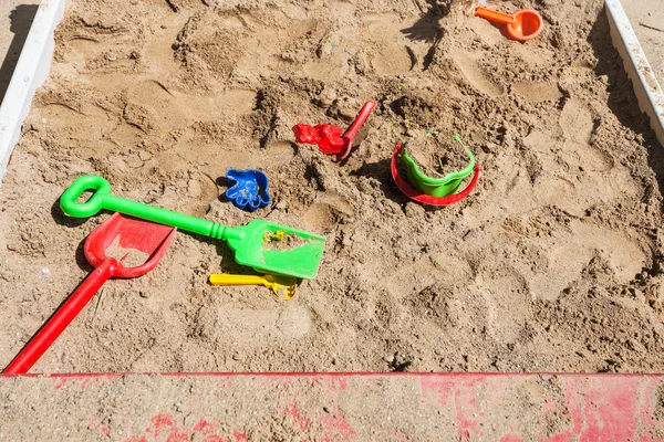 Sandbox with toys on children playground — Stock Photo, Image