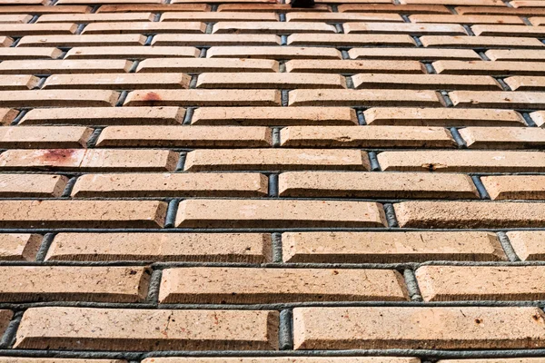 Onderste weergave van muur uit bakstenen afwerking — Stockfoto