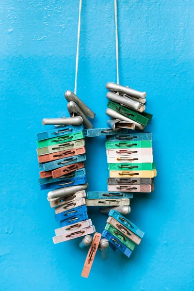 Bunch of old clothespins — Stock Photo, Image