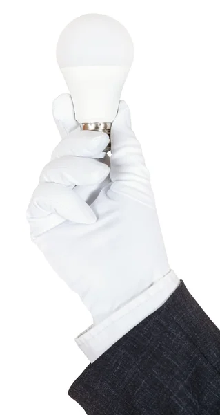 Iş takım elbiseli el ve eldiven Led lamba tutar — Stok fotoğraf